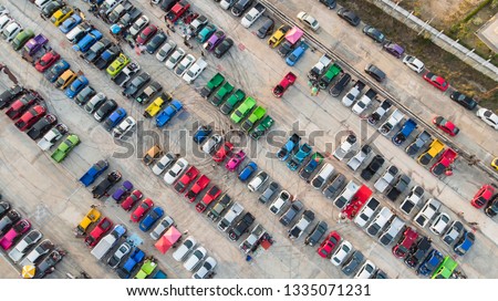 Aerial view car show on cement car parking.