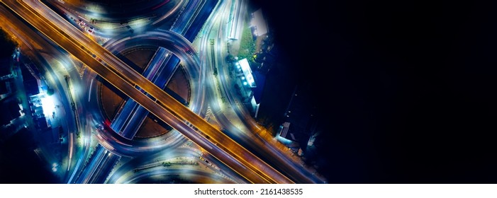 Aerial View Of Car Traffic Transportation Above Circle Roundabout Road Of Drone Aerial View Fly , High Angle. Public Transport Or Commuter City Life Concept Of Economic And Energy, Infrastructure	