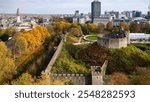 Aerial view of Cardiff Castle with beautiful, golden autumn leaves