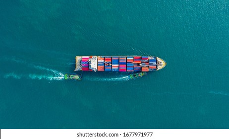 Aerial view cargo ship of business logistic transportation sea freight, Cargo ship, Cargo container in factory harbor at industrial estate for import export around in the world, Trade Port / Shipping 