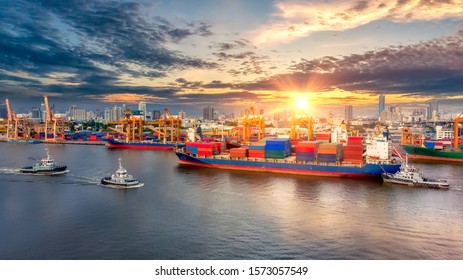 Aerial view of cargo ship, cargo container in warehouse harbor at thailand, container ship in import export and business logistic with sunset