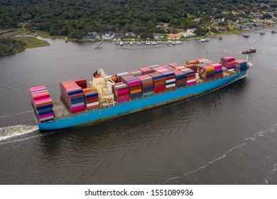 Aerial View Of Cargo Ship Entering Port In Jacksonville Florida. 