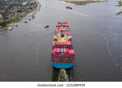 Aerial View Of Cargo Ship Entering Port In Jacksonville Florida. 