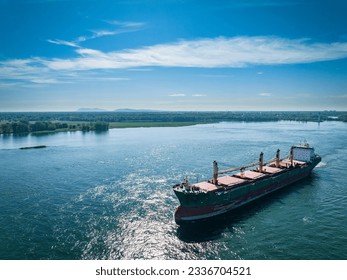 Aerial view of a cargo ship near the Port of Montreal on the St. Lawrence River - Powered by Shutterstock