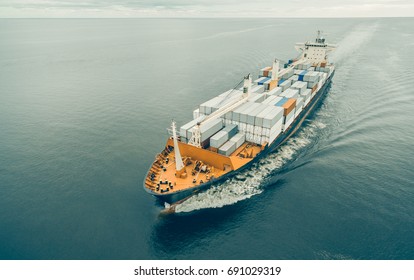 Aerial View Of Cargo Ship Sailing In Open Sea