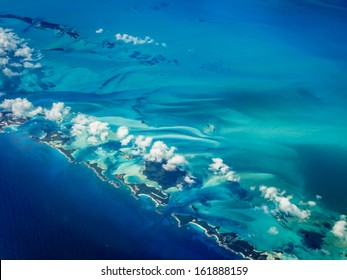 Aerial view of Caribbean islands chain creating a blue desert contour