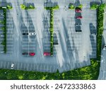 Aerial view of cars at car park, almost empty parking lot in Finland.