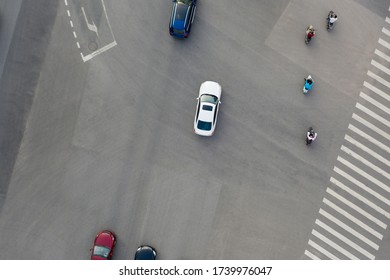 Aerial View Of Cars And Electric Bicycle Driving On City Road Top View