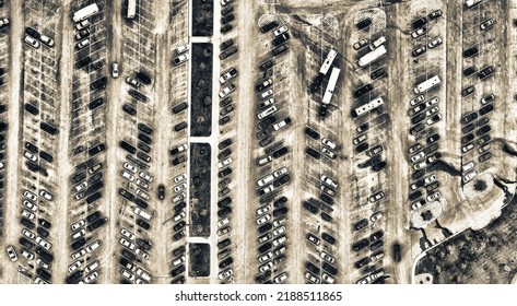 Aerial View Of Cars At Large Outdoor Parking Lots, USA. Outlet Mall Parking Congestion And Crowded Parking Lot, Other Cars Try Getting In And Out, Finding Parking Space.