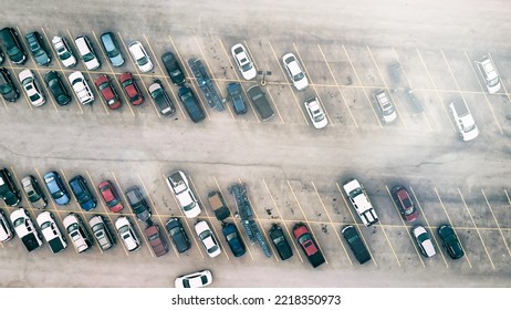 Aerial View Of Cars At Large Outdoor Parking Lots, USA. Outlet Mall Parking Congestion And Crowded Parking Lot, Other Cars Try Getting In And Out, Finding Parking Space.