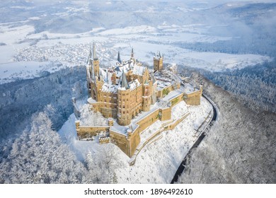 Aerial view of the Castle Hohenzollern in Germany by snowy winter.