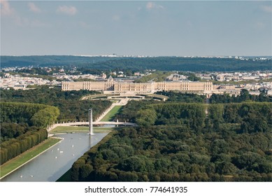 Aerial View Of The Castle Of Versailles And The Big Channel In France