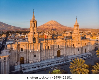 Aerial view of the cathedral of Arequipa Peru at sunset with the background of the Misti volcano