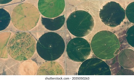 Aerial view of center pivot irrigation landmarks an agricultural technique also called water wheel screenshot of high resolution animation - Powered by Shutterstock