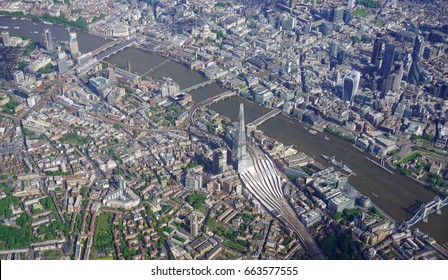 Aerial View Of Central London And The River Thames From An Airplane Window