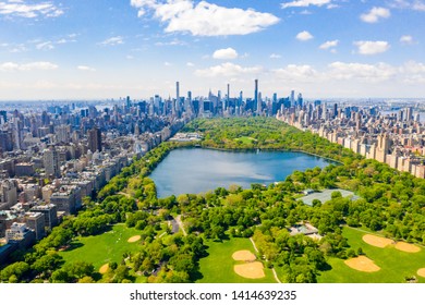 Aerial view of the Central park in New York with golf fields and tall skyscrapers surrounding the park. - Shutterstock ID 1414639235