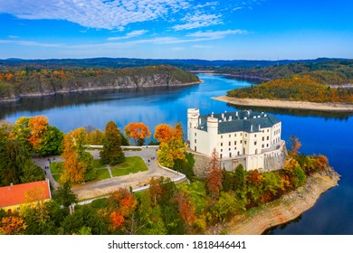Aerial view chateau Orlik, above Orlik reservoir in beautiful autumn nature. Romantic royal Schwarzenberg castle above water level. Czechia. Orlik castle across the River Vltava, Czech Republic.