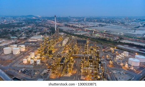 Aerial view of chemical oil refinery plant, power plant at sunset sky for industry concept.