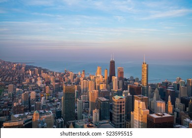 Aerial view of Chicago downtown at sunset from high above.