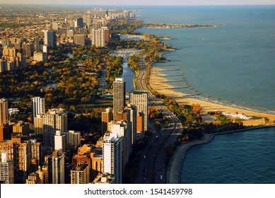 An Aerial View Of The Chicago Skyline And Lakeshore In Autumn