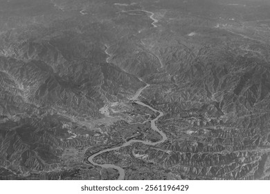 Aerial view of China's meandering Yangtze River and mountain ranges in black and white tones - Powered by Shutterstock