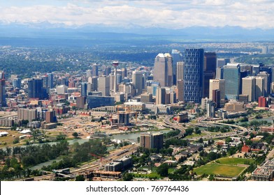 Aerial View Of The City Of Calgary With The Rocky Mountains In The Background, Alberta, Canada