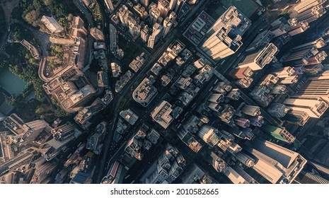 Aerial view city central park, trains, buildings and skyscrapers in Hong Kong at the sunset. Asia business concept photo - Shutterstock ID 2010582665