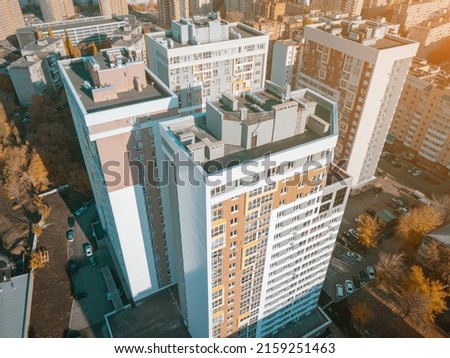 Aerial view of a city district with residential block with multi-storey apartment buidlings