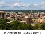 An aerial view of the city of Dubuque against a blue cloudy sky on a sunny day, Iowa, United States