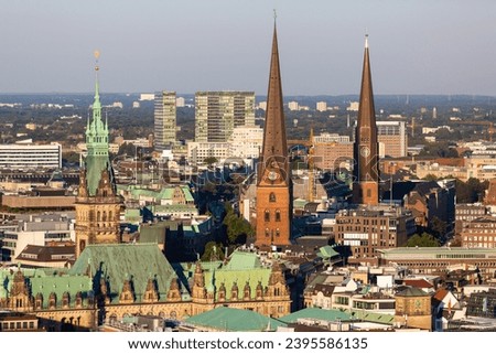 Aerial view of the City Hall, Church of Saint Peter and St. James' Church in Hamburg