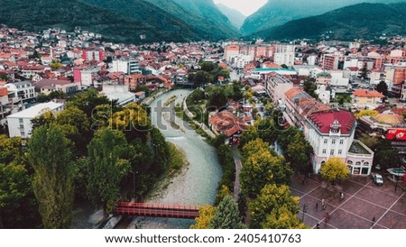 Aerial view of a city in a mountain valley in Peja
