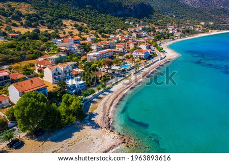 Aerial view of city of Poros, Kefalonia island in Greece. Poros city in middle of the day. Cephalonia or Kefalonia island, Ionian Sea, Greece. Poros village, Kefalonia island, Ionian islands, Greece.