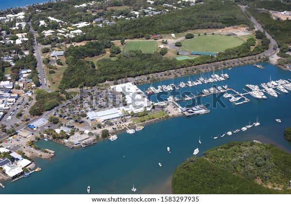 Aerial view to the City of Port Douglas on the\
east coast of Australia