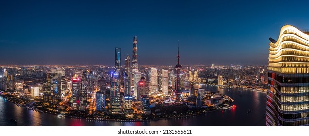 Aerial View Of City Skyline And Modern Commercial Buildings In Shanghai At Night, China.