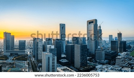 Aerial view of city skyline and modern buildings at sunrise in Ningbo, Zhejiang Province, China. East new town of Ningbo, It is the economic, cultural and commercial center of Ningbo City.
