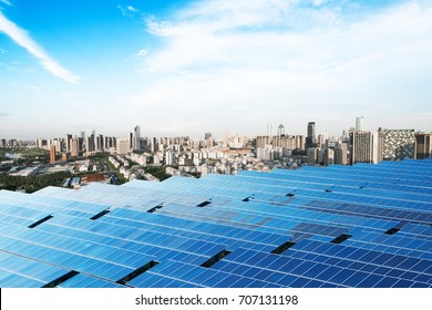 Aerial View Of The City And The Tower On Top Of The Solar Panel