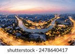 An aerial view of the city of Yangzhou in China, featuring Dashuiwan Park, Beijing-Hangzhou Grand Canal and the skyline illuminated by night lights