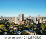 An aerial view of a  cityscape featuring a towering skyscraper under the blue sky in CityScape, Croydon