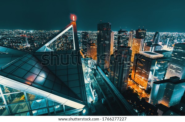 Aerial view cityscape at night in Tokyo, Japan\
from a skyscraper