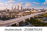 Aerial view of Cleveland, Ohio skyline and I90 interstate highway at sunset. Cleveland is a major city in the U.S. state of Ohio and the county seat of Cuyahoga County.