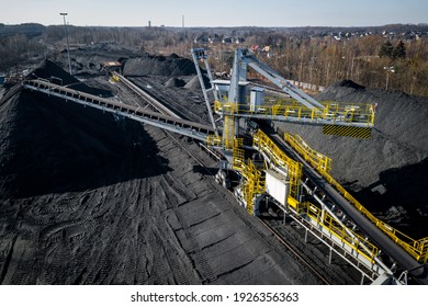 Aerial View Of Coal Mine. Industrial Place From Above. Heavy Machinery Top View.