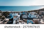 Aerial view of coastal buildings near Baishawan beach in Kenting Taiwan under bright sunny sky