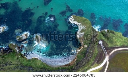 Aerial view of the coastal headland, Whiterocks at the Maghera Cross Viewpoint in Northern Ireland, situated on the Dunluce Road, Bushmills, County Antrim. On the Causeway coast near Dunluce castle