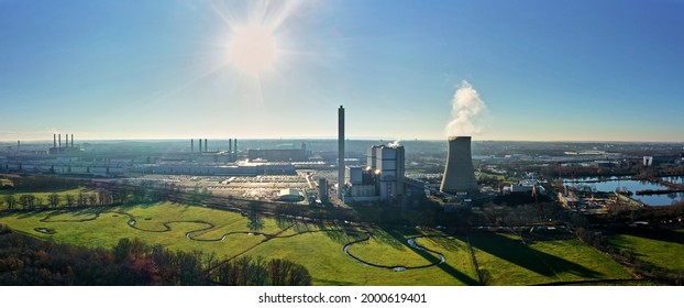 Aerial view of cogeneration plant west quake of a car factory in Wolfsburg with view against the bright midday sun