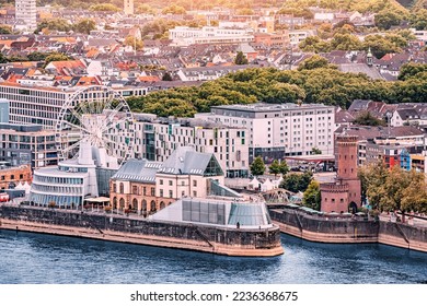 Aerial view of Cologne island at Rhine river with Ferris wheel and chocolate and olympic sport museum. Travel in Germany
