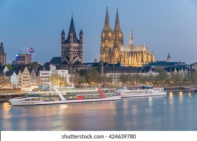 Aerial View Cologne Over The Rhine River With Cruise Ship In Cologne, Germany. 
