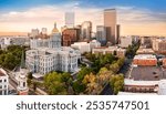 Aerial view of Colorado Capitol and Denver, Colorado skyline at sunset. Denver is a consolidated city and county, the capital, and most populous city of the U.S. state of Colorado