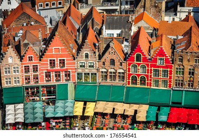 Aerial view of colorful square and houses in Bruges, Belgium