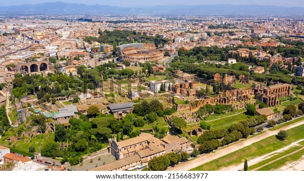 Aerial view of Colosseum and Palatine Hill in\
Rome, Italy. According to the legend, it is from this hill that the\
history of Rome began.