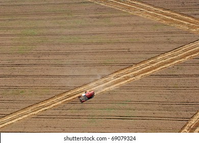 Aerial View : Combine Harvester Working In The Fields